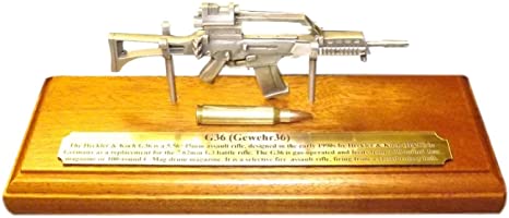 Pewter G36 on solid light oak wooden plinth. Presentation